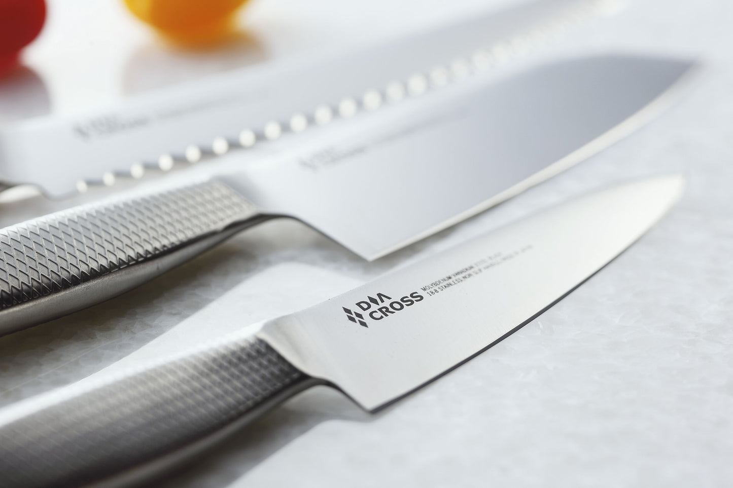 DiaCross knives made by Sumikama Cutlery in Japan (Kasumi Knives). Blades are Molybdenium Vanadium steel and handles are 18/8 stianless steel. Designed with the Diamond cross on the handles for better grip.