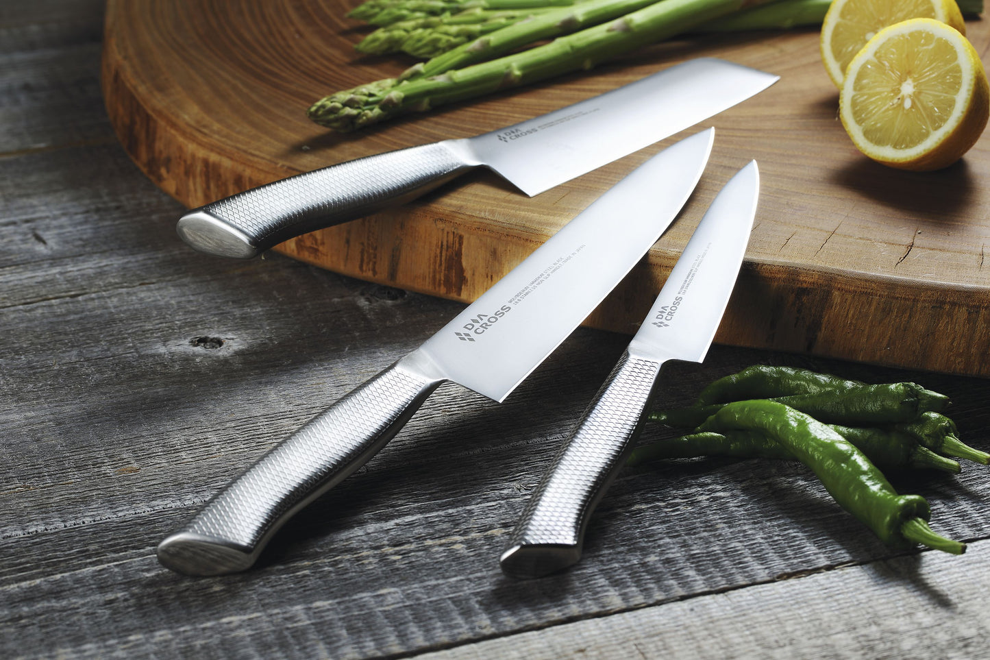 DiaCross knives made by Sumikama Cutlery in Japan (Kasumi Knives). Blades are Molybdenium Vanadium steel and handles are 18/8 stianless steel. Designed with the Diamond cross on the handles for better grip.